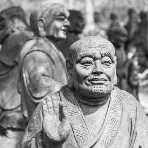 black and white Buddhist statue wallpaper mural